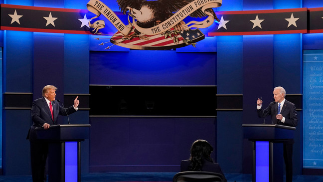 FILE - President Donald Trump, left, and Democratic presidential candidate former Vice President Joe Biden speak during the debate in Nashville, Tenn. on Oct. 22, 2020. (AP Photo/Patrick Semansky, File)