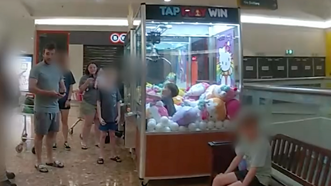Toddler rescued after becoming trapped in claw machine (Queensland Police Department)