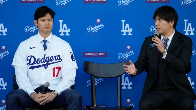 FILE - Los Angeles Dodgers' Shohei Ohtani, left, and interpreter Ippei Mizuhara answer questions during a news conference at Dodger Stadium on Dec. 14, 2023, in Los Angeles.{&nbsp;} (AP Photo/Ashley Landis,File)