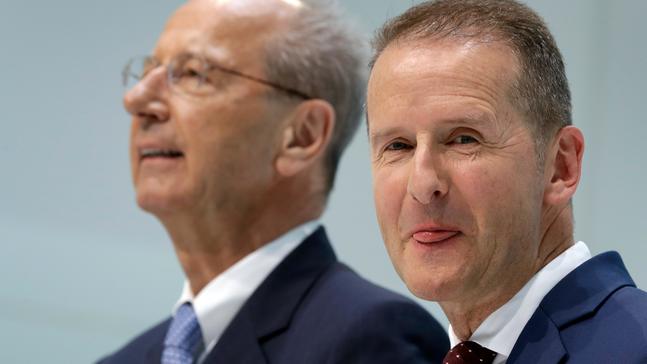 FILE - In this Friday, April 13, 2018, file photo, Herbert Diess, right, CEO of the Volkswagen, and Hans Dieter Poetsch, left, chairman of the board of directors of Volkswagen address the media during a press conference in Wolfsburg, Germany.{&nbsp;} (AP Photo/Michael Sohn, File)