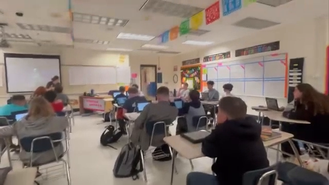 Indian River County Sheriff's Office Deputy and Army Reservist Tiffiany Welsh has been gone since July for training. She came back for the holidays to surprise her son. (IRCSO)