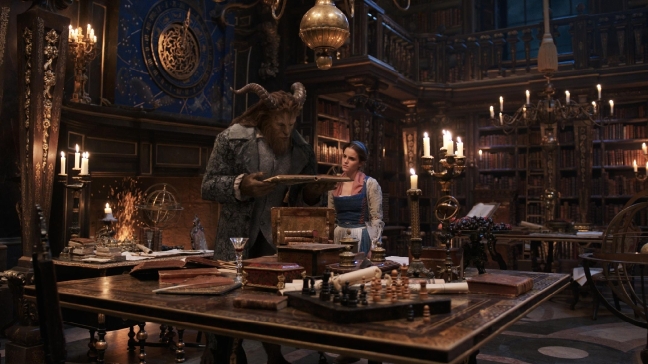 The Beast (Dan Stevens) and Belle (Emma Watson) in the castle library in Disney's "Beauty and the Beast," a live-action adaptation of the studio's animated classic which is a celebration of one of the most beloved stories ever told. (Disney)