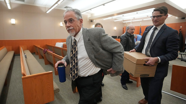 Terry Sanderson, the Utah man suing Gwyneth Paltrow, leaves the courtroom during a lunch recess, Wednesday, March 29, 2023, in Park City, Utah. He accuses her of crashing into him on a beginner run at Deer Valley Resort, leaving him with brain damage and four broken ribs. (AP Photo/Rick Bowmer, Pool)