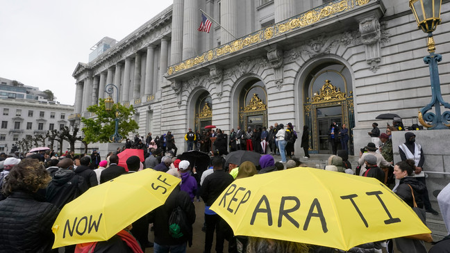 FILE - A crowd listens to speakers at a reparations rally outside of City Hall in San Francisco, on March 14, 2023. (AP Photo/Jeff Chiu, File)