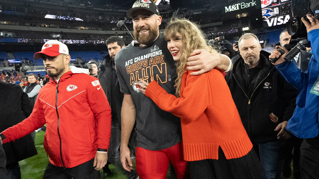 FILE - Kansas City Chiefs tight end Travis Kelce and Taylor Swift walk together after an AFC Championship NFL football game between the Chiefs and the Baltimore Ravens, Jan. 28, 2024, in Baltimore. (AP Photo/Julio Cortez, File)