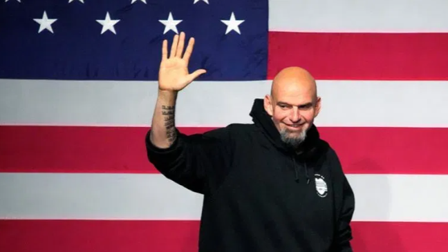 File John Fetterman takes the stage at an election night party in Pittsburgh on Nov.9, 2022 (AP Photo/ Gene J. Puskar, file)