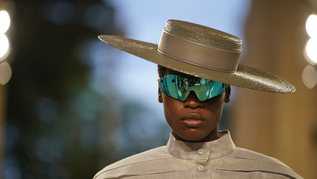 A model wears a creation by Louis Vuitton during a fashion show for the Cruise 2025 collection in the Park Guell in Barcelona, Spain, Thursday, May 23, 2024. (AP Photo/Joan Mateu)