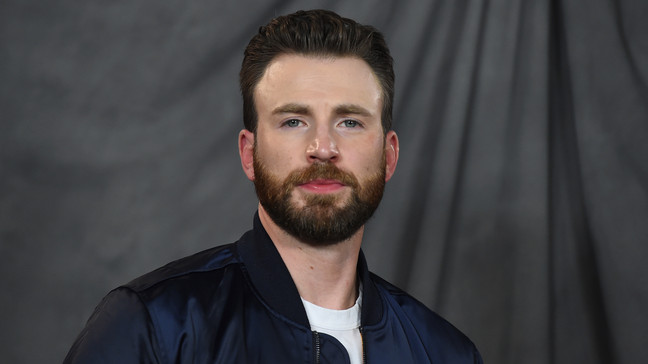 FILE - Chris Evans attends the "Knives Out" photo call at the Four Seasons Hotel on Nov. 15, 2019, in Los Angeles. The “Captain America” star has a new title — he's been named People magazine's Sexiest Man Alive. The selection was announced Monday night, Nov. 7, 2022, on Stephen Colbert's late night show and on the magazine's website. (Photo by Jordan Strauss/Invision/AP, File)