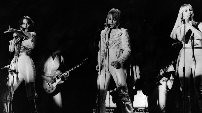 Swedish pop group Abba on stage in Denmark. The three members of the group singing are Frida Lyngstad, Bjorn Ulvaeus and Agnetha Faltskog. (Photo by Keystone/Getty Images)