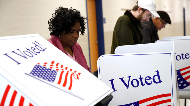 FILE - Voters fill out their ballots at a polling place, Feb. 29, 2020, in Charleston, S.C. (AP Photo/Patrick Semansky, File)