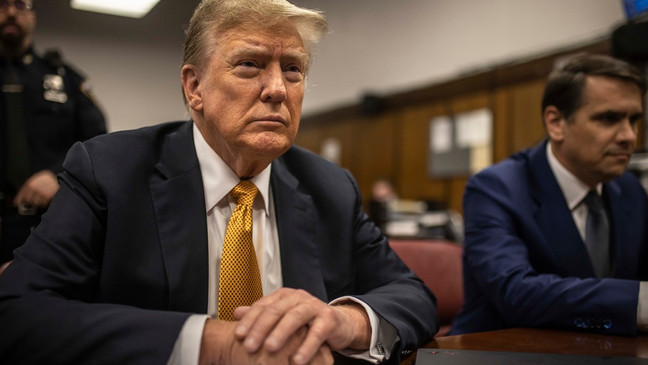 Former President Donald Trump sits in a courtroom next to his lawyer Todd Blanche, right, before the start of the day's proceedings in the Manhattan Criminal court, Tuesday, May 21, 2024, in New York. (Dave Sanders/The New York Times via AP, Pool)
