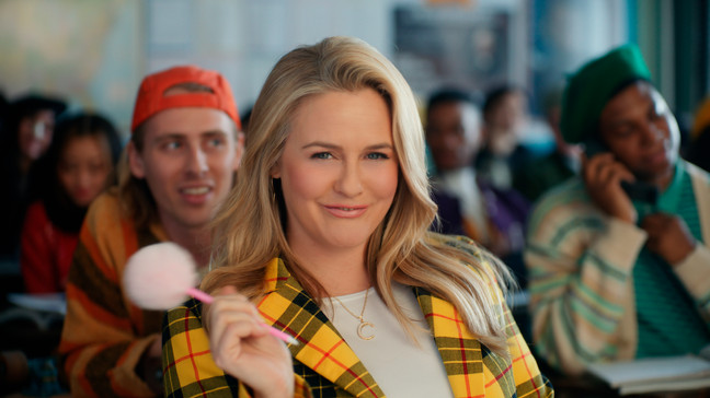 This photo provided by Rakuten Rewards shows Alicia Silverstone in a scene from Rakuten Rewards 2023 Super Bowl NFL football spot. Big name advertisers are paying as much as $7 million for a 30-second spot during the big game on Sunday, Feb. 12, 2023. In order to get as much as a return on investment for those million, most advertisers release their ads in the days ahead of the big game to get the most publicity for their spots. (Rakuten Rewards via AP)