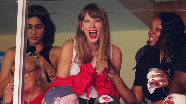 Taylor made it official when she appeared at a Chiefs game with Travis' mom, Donna Kelce. (Photo courtesy: Getty Images)