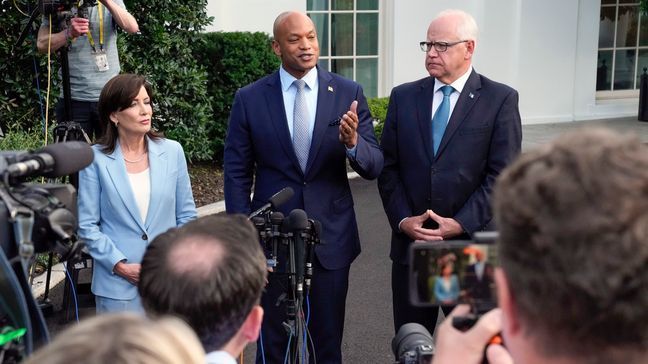 Maryland Gov. Wes Moore speaks to reporters after meeting with President Joe Biden, Wednesday, July 3, 2024, at the White House in Washington, as New York Gov. Kathy Hochul and Minnesota Gov. Tim Walz listen. (AP Photo/Jacquelyn Martin)