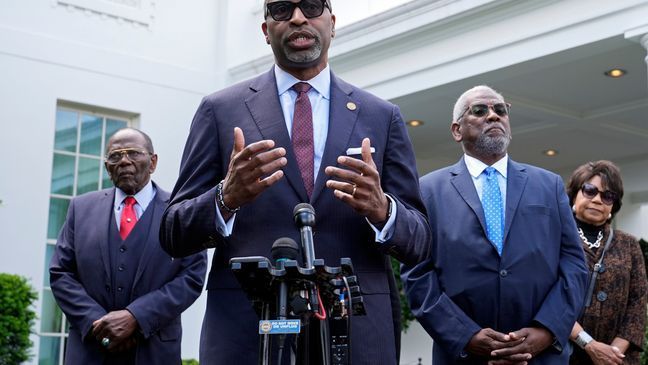 NAACP President Derrick Johnson, second from left, speaks to reporters outside the White House in Washington, Thursday, May 16, 2024, after meeting with President Joe Biden to mark the 50th anniversary of the historic Supreme Court decision. Johnson is joined by, from left, Brown v. Board of Education plaintiff and veteran John Stokes, Nathaniel Briggs, son of Brown v. Board of Education named plaintiff Harry Briggs Jr., and Cheryl Brown Henderson, daughter of Brown v. Board of Education named plaintiff Oliver Brown. (AP Photo/Susan Walsh)