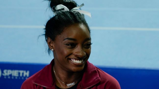 FILE - Simone Biles talks to the members of the media affter the U.S. Classic gymnastics competition Saturday, Aug. 5, 2023, in Hoffman Estates, Ill. (AP Photo/Morry Gash)