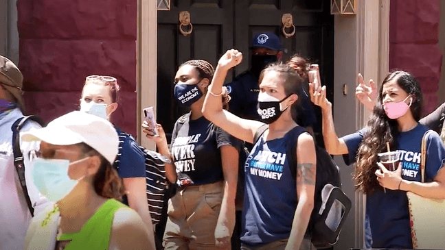 Protesters gather outside of Republican Senator Mitch McConnell's home for unemployment benefits rally Wednesday afternoon.  (Tom Roussey/ABC7){&nbsp;}{p}{/p}