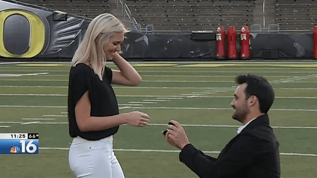 Sports producer Alex Altman proposes to his college sweetheart Jessica Waite at Autzen Stadium on August 11, 2018.{p}{/p}