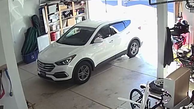 A home surveillance camera caught a bold burglary inside a West Jordan family’s garage where a woman steals tools and flees in a white Hyundai. (Photo: West Jordan Police Department){p}{/p}