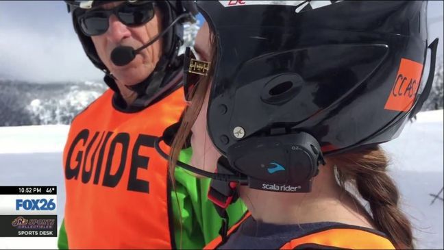 Shaela and her guide, Randy Coffman with Adaptive Sports Center, communicate through their special helmets (KMPH)