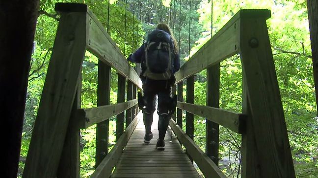 Stacy Kozel hiking with leg braces. (Photo: Courtney Wheaton/WSET)