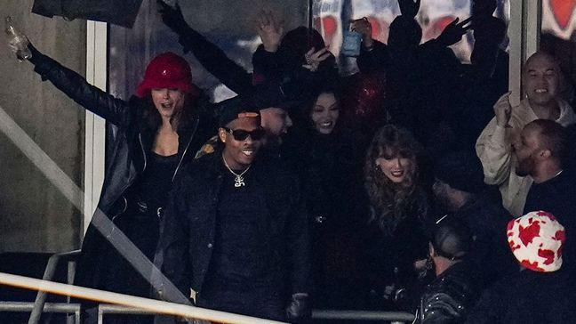 Taylor Swift, center right, cheers during the first half of an AFC Championship NFL football game between the Baltimore Ravens and the Kansas City Chiefs, Sunday, Jan. 28, 2024, in Baltimore. (AP Photo/Julio Cortez)