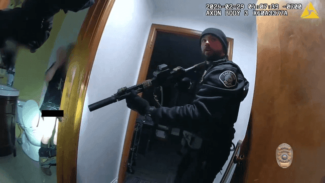 Authorities in Colorado say a burglary suspect was on the toilet when office tracked him down and arrested him on Thursday, Feb. 29, 2024. (Screenshot from video courtesy of Lakewood Police Department)