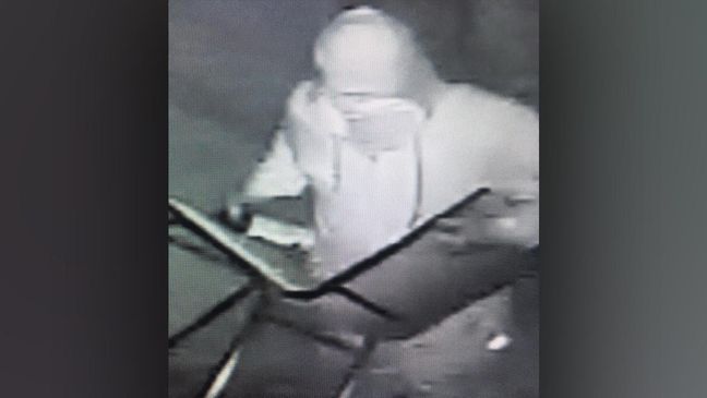 A still image from security cameras of the person suspected of vandalizing Asheville's Fraternal Order of Police lodge. (Photo provided by Asheville Police Department)