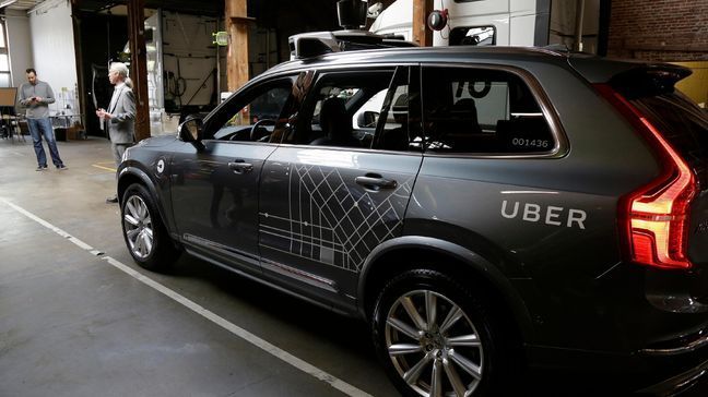 In this photo taken Tuesday, Dec. 13, 2016, an Uber driverless car is displayed in a garage in San Francisco. Uber is bringing a small number of self-driving cars to its ride-hailing service in San Francisco - a move likely to both excite the city’s tech-savvy population and spark a conflict with California regulators. The Wednesday, Dec. 14, launch in Uber’s hometown expands a public pilot program the company started in Pittsburgh in September. (AP Photo/Eric Risberg)