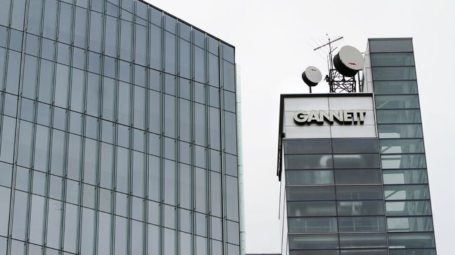 FILE - This file photograph taken July 14, 2010, shows Gannett headquarters in McLean, Va. Newspaper publisher Gannett said Monday, April 25, 2016, that it wants to buy rival Tribune Publishing in a deal that would give the owner of USA Today control of the Los Angeles Times, the Chicago Tribune and several other newspapers. (AP Photo/Jacquelyn Martin, File)