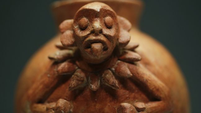 A pot with a monkey, 900-1250 AD, is displayed at the exhibition 'The Maya - Language of Beauty' at the Martin-Gropius-Bau museum in Berlin, Monday, April 11, 2016. The exhibition will run from April 12. until August 7, 2016. (AP Photo/Markus Schreiber)