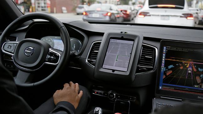 Uber is bringing a small number of self-driving cars to its ride-hailing service in San Francisco - a move likely to both excite the city’s tech-savvy population and spark a conflict with California regulators.  (AP Photo/Eric Risberg)