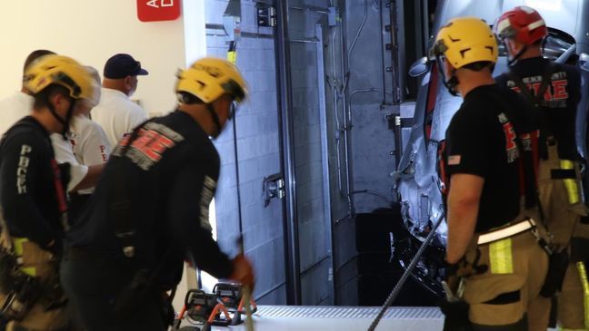 Elevator malfunction leaves Ferrari hanging at 'high-end' dealership in Florida (Photo: Palm Beach County Fire Rescue){&nbsp;}