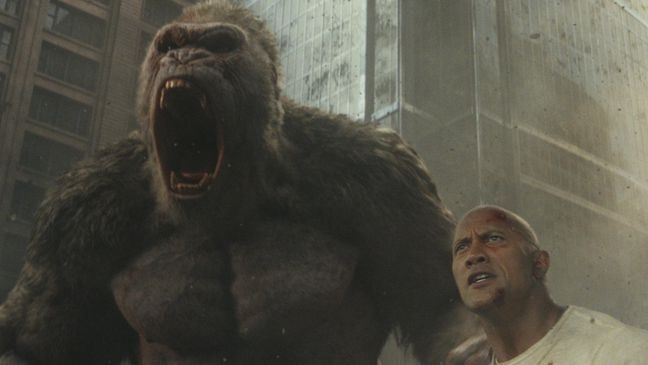 (L-R) JASON LILES as George and DWAYNE JOHNSON as Davis Okoye in New Line Cinema's and ASAP Entertainment's action adventure "RAMPAGE," a Warner Bros. Pictures release. (Photo: Warner Bros.){&nbsp;}