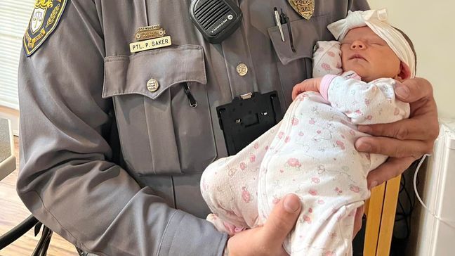 A police officer from New Jersey has reunited with a family nearly a month after he helped deliver a baby girl at their home. (Photo: Toms River Police Department)