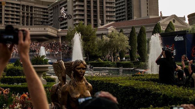 Motorsports competitor Travis Pastrana completes the Caesars Palace fountain jump Sunday July 8, 2018 in Las Vegas, Nev. Pastrana paid tribute to Evel Knievel by completing three separate jumps during "Evel Live" which was broadcasted live on the History Channel. CREDIT: Joe Buglewicz/Las Vegas News Bureau