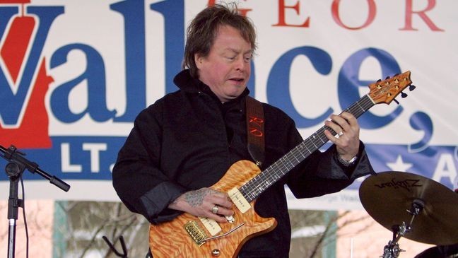 FILE - Singer Rick Derringer performs during a campaign rally kicking off George Wallace Jr's bid for the office of lieutenant governor in Montgomery, Ala., on Feb. 18, 2006. (AP Photo/Rob Carr, File)