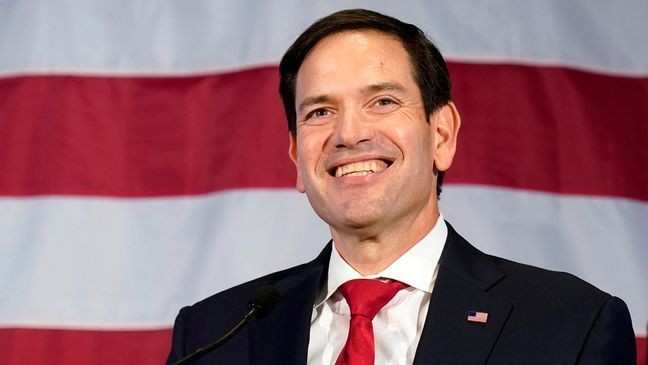 FILE - Sen. Marco Rubio, R-Fla., smiles as he addresses supporters Nov. 8, 2012, in Miami. (AP Photo/Wilfredo Lee, File)