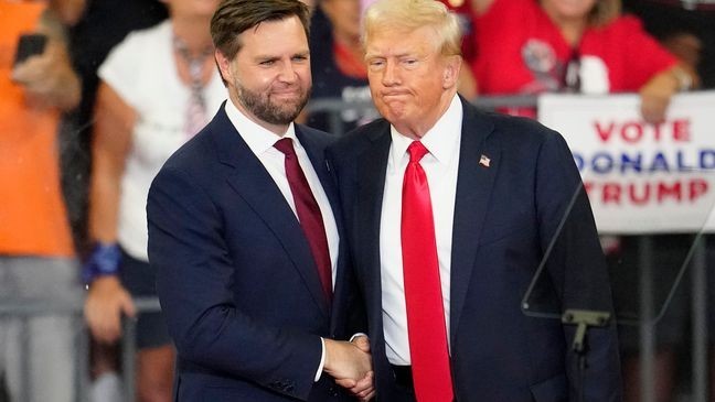 FILE - Republican vice presidential candidate Sen. JD Vance, R-Ohio, left, and Republican presidential candidate former President Donald Trump, shake hands at a campaign rally in Atlanta, Aug. 3, 2024.Â{&nbsp;}(AP Photo/Ben Gray, File)