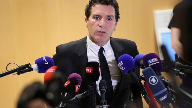 French actor Gerard Depardieu's lawyer Jeremie Assous speaks with the media after a verdict was delivered on accusations that the actor sexually assaulted two women who were working on a film with him in 2021, in Paris, Tuesday, May 13, 2025. (AP Photo/Thomas Padilla)