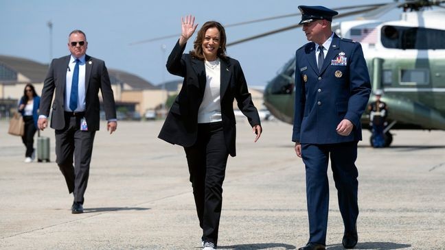 Democratic presidential nominee Vice President Kamala Harris boards Air Force Two at Joint Base Andrews, Md., Wednesday, Aug. 28, 2024, as she travels to Savannah, Ga., for a two-day campaign bus tour. (Saul Loeb/Pool via AP)