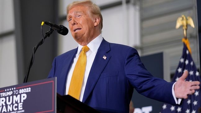 Republican presidential nominee former President Donald Trump speaks during a news conference at Austin-Bergstrom International Airport, Friday, Oct. 25, 2024, in Austin, Texas. (AP Photo/Alex Brandon)