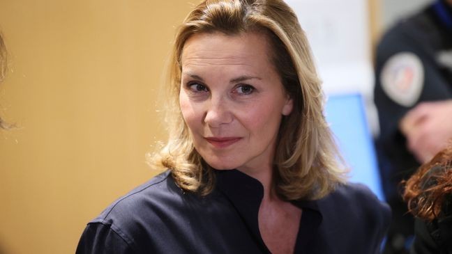 A plaintiff speaks with the media outside a Paris court, after a verdict was delivered on accusations that French actor Gerard Depardieu sexually assaulted two women who were working on a film with him in 2021, in Paris, Tuesday, May 13, 2025. (AP Photo/Thomas Padilla)