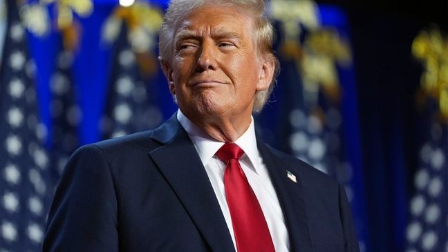 Republican presidential nominee former President Donald Trump arrives at an election night watch party at the Palm Beach Convention Center, Wednesday, Nov. 6, 2024, in West Palm Beach, Fla. (AP Photo/Evan Vucci)