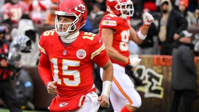 Kansas City Chiefs quarterback Patrick Mahomes (15) celebrates a touchdown against the Cleveland Browns during the first half of an NFL football game, Sunday, Dec. 15, 2024, in Cleveland. (AP Photo/David Richard)