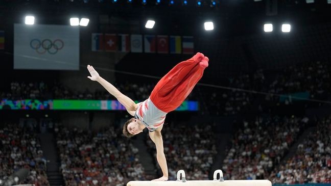 Stephen Nedoroscik, of United States, performs on the pommel during the men's artistic gymnastics team finals round at Bercy Arena at the 2024 Summer Olympics, Monday, July 29, 2024, in Paris, France. (AP Photo/Abbie Parr)