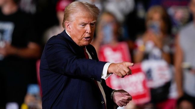 Republican presidential candidate former President Donald Trump gestures during a campaign rally in Harrisburg, Pa., Wednesday, July 31, 2024. (AP Photo/Matt Rourke)