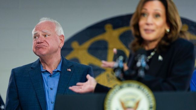 Democratic presidential nominee Vice President Kamala Harris, with Democratic vice presidential nominee Minnesota Gov. Tim Walz, left, speaks at a campaign rally at UAW Local 900, Thursday, August 8, 2024, in Wayne, Mich. (AP Photo/Julia Nikhinson)