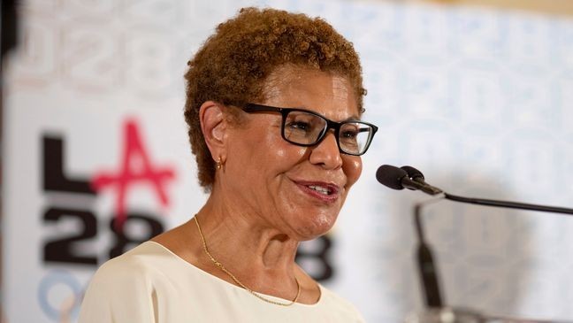 FILE- Los Angeles Mayor Karen Bass speaks at a reception at the U.S. Chief of Mission Residence to commemorate the opening of the 2024 Summer Olympics and celebrate the upcoming 2028 Olympic Games, to be held in Los Angeles, Saturday, July 27, 2024, in Paris.As the Olympics close in Paris, Los Angeles will take the torch. The city will become the third city to host the games three times as it adds 2028 to the locally legendary years of 1932 and 1984.(AP Photo/David Goldman, File)