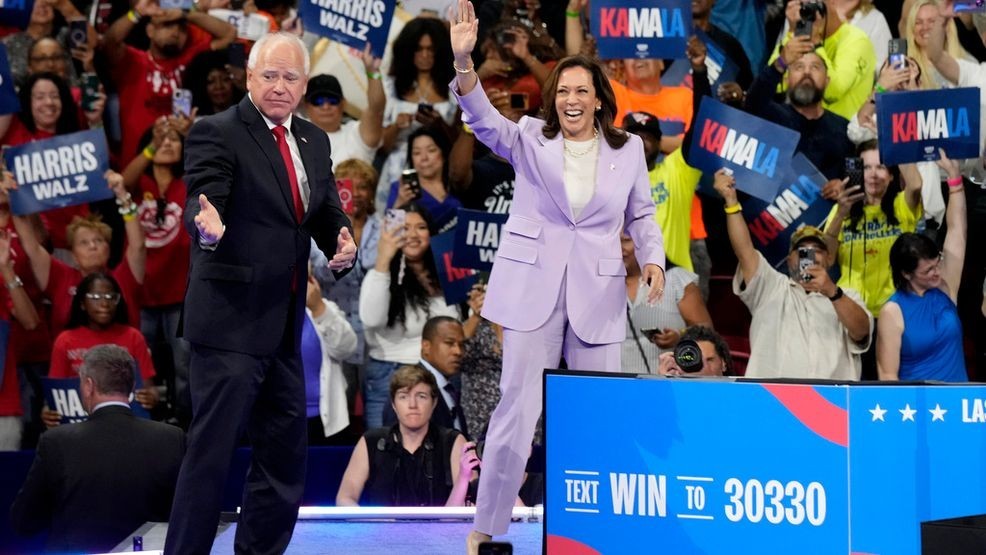 Democratic presidential nominee Vice President Kamala Harris, right, and running mate Minnesota Gov. Tim Walz are pictured at a campaign rally at the University of Nevada, Las Vegas on Saturday, Aug. 10, 2024. (AP Photo/Jae Hong)